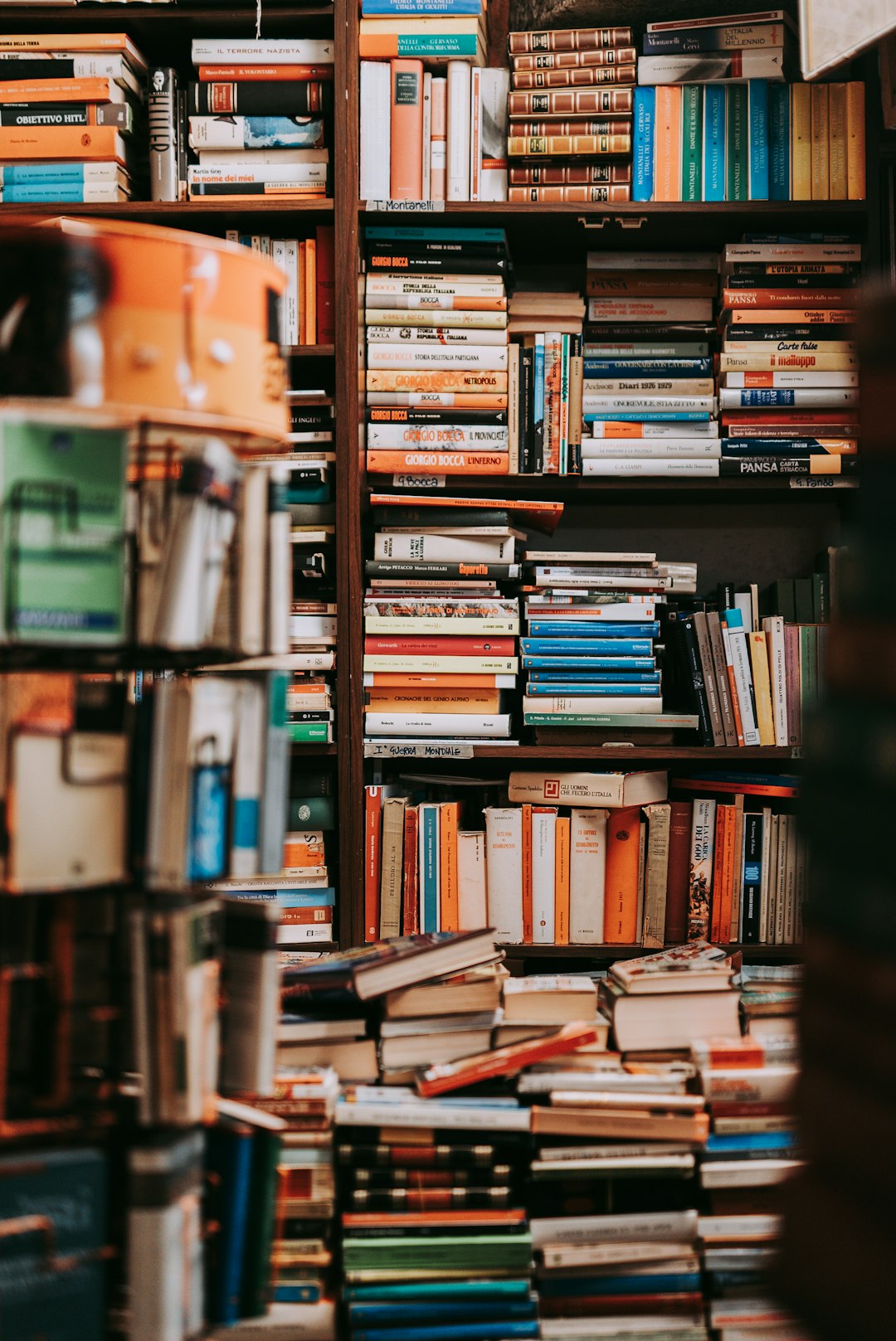 books-on-brown-wooden-shelf-50g3fvyqxx0